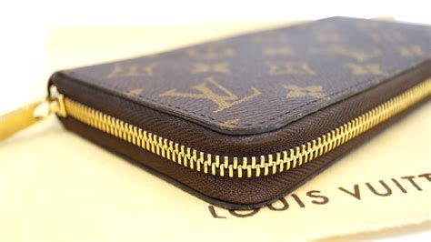 louis vuitton embossed monogram wallet|louis vuitton wallet zipper.